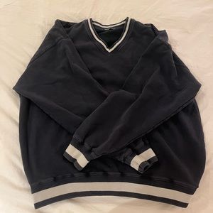 this is a brandy melville modern vintage sweater. it is one size (oversized).